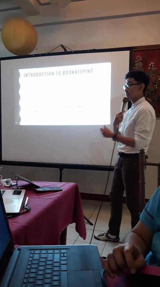 Jayson presenting an Introduction to Bookkeeping session to DepEd participants